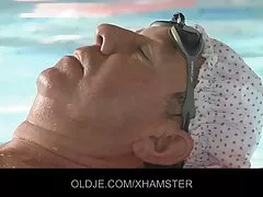 Old man&#039;s cock sucked in the pool by a redhead teeny