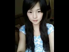Cute chinese teen dancing on webcam