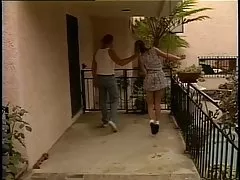 Brunette in summer dress seduces her neighbor