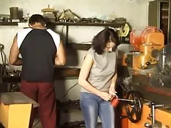 Brunette Gangbanged in Workshop